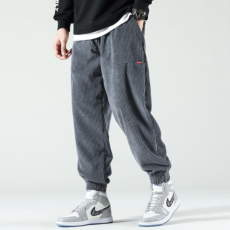 Men's relaxed corduroy jogger trousers with elasticated cuffs and drawstring waist