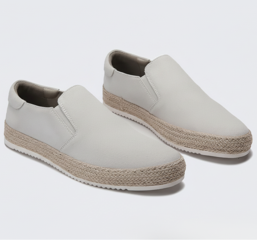 Men's plain slip-on loafers with woven sole trim and flat textured outsole