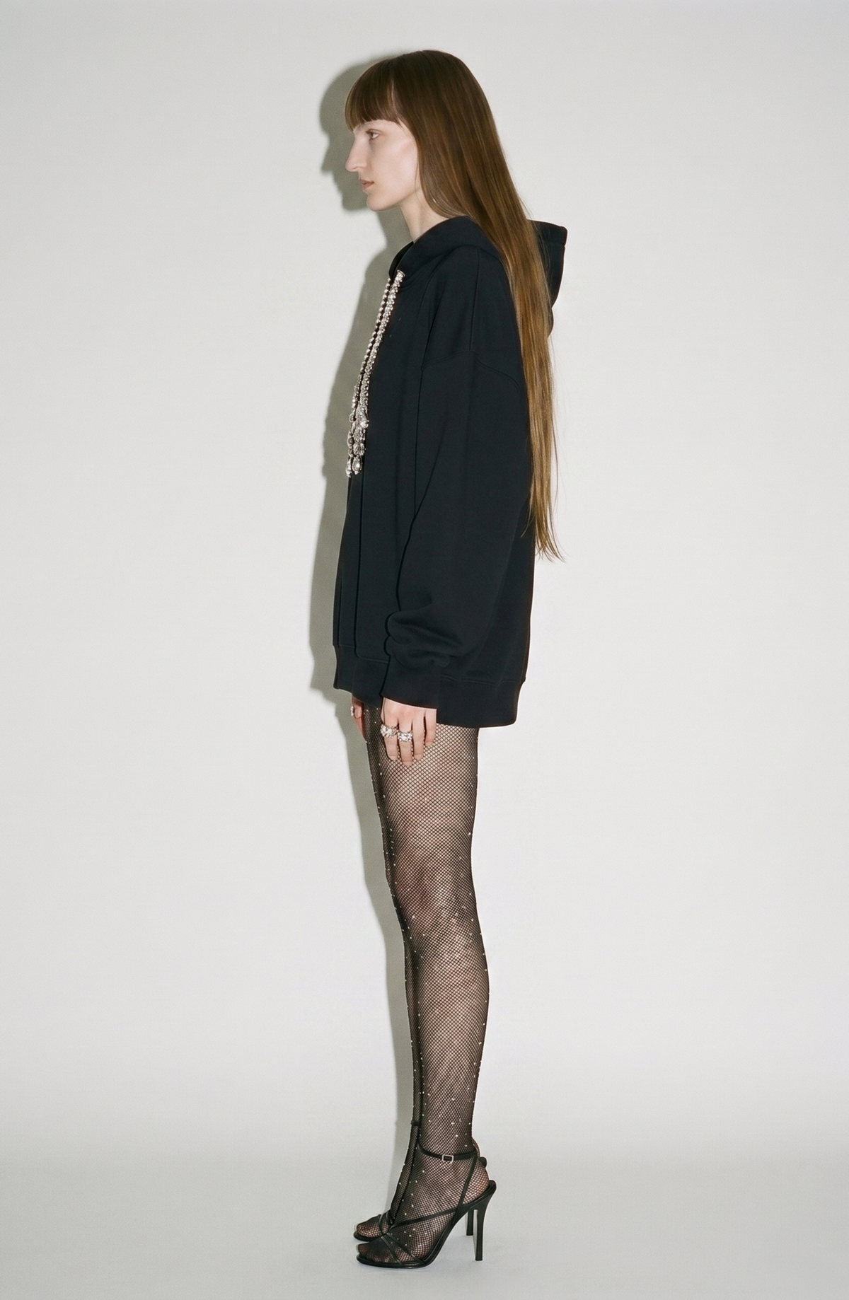 Women's black hoodie with crystal drawstring details and long sleeves
