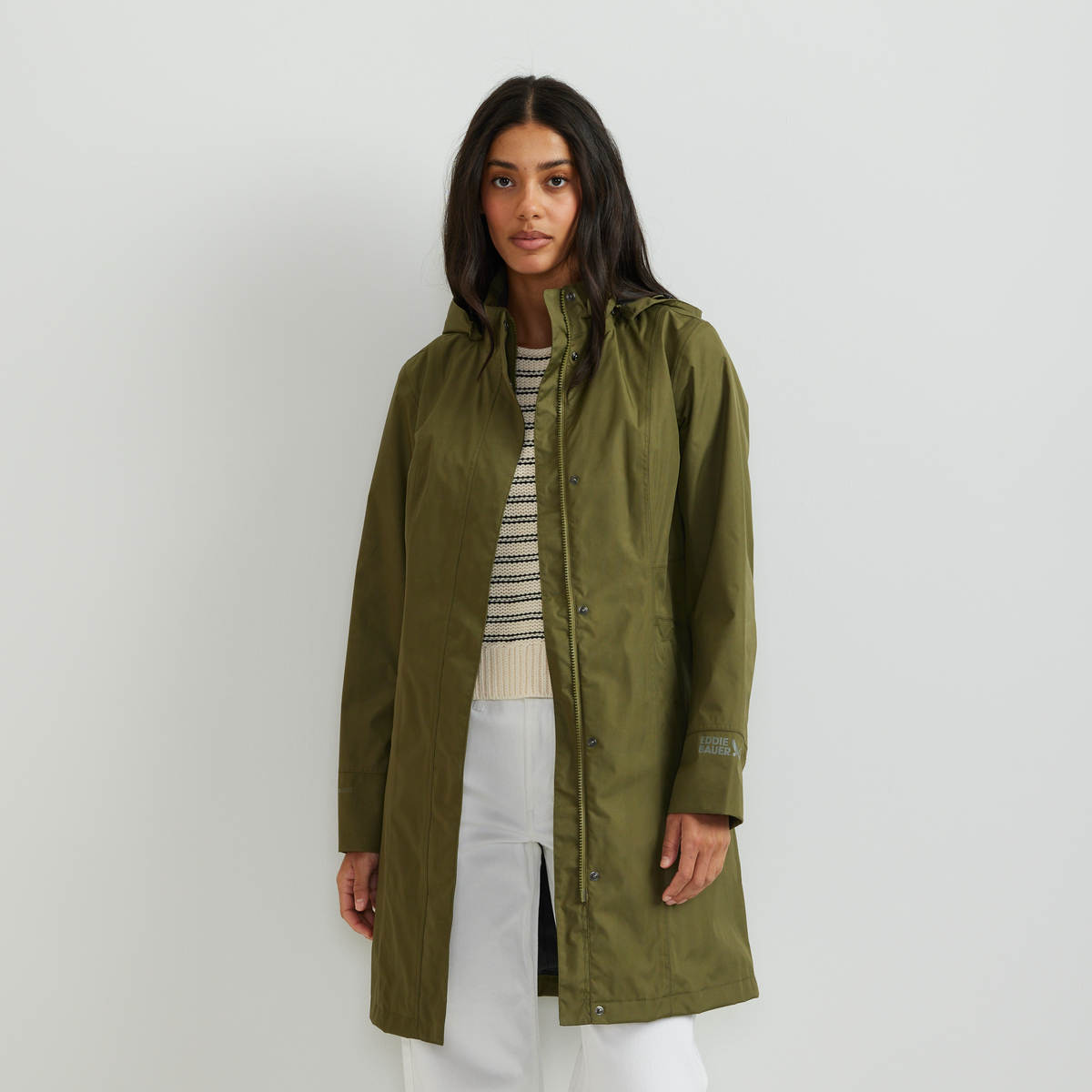 Women's long hooded waterproof trench coat with front zip and welt pockets