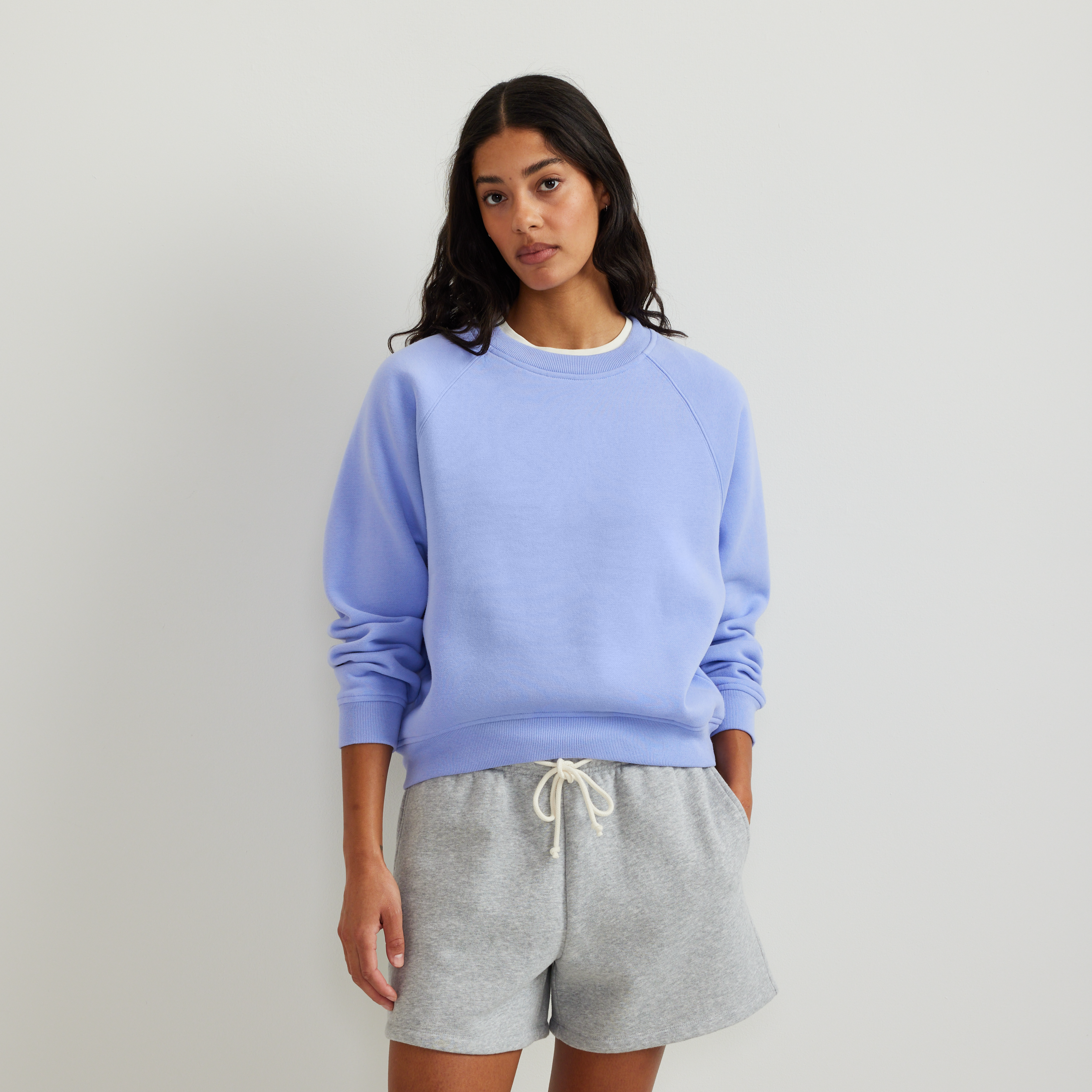 Women's long-sleeve crew sweatshirt with ribbed trims and raglan sleeves