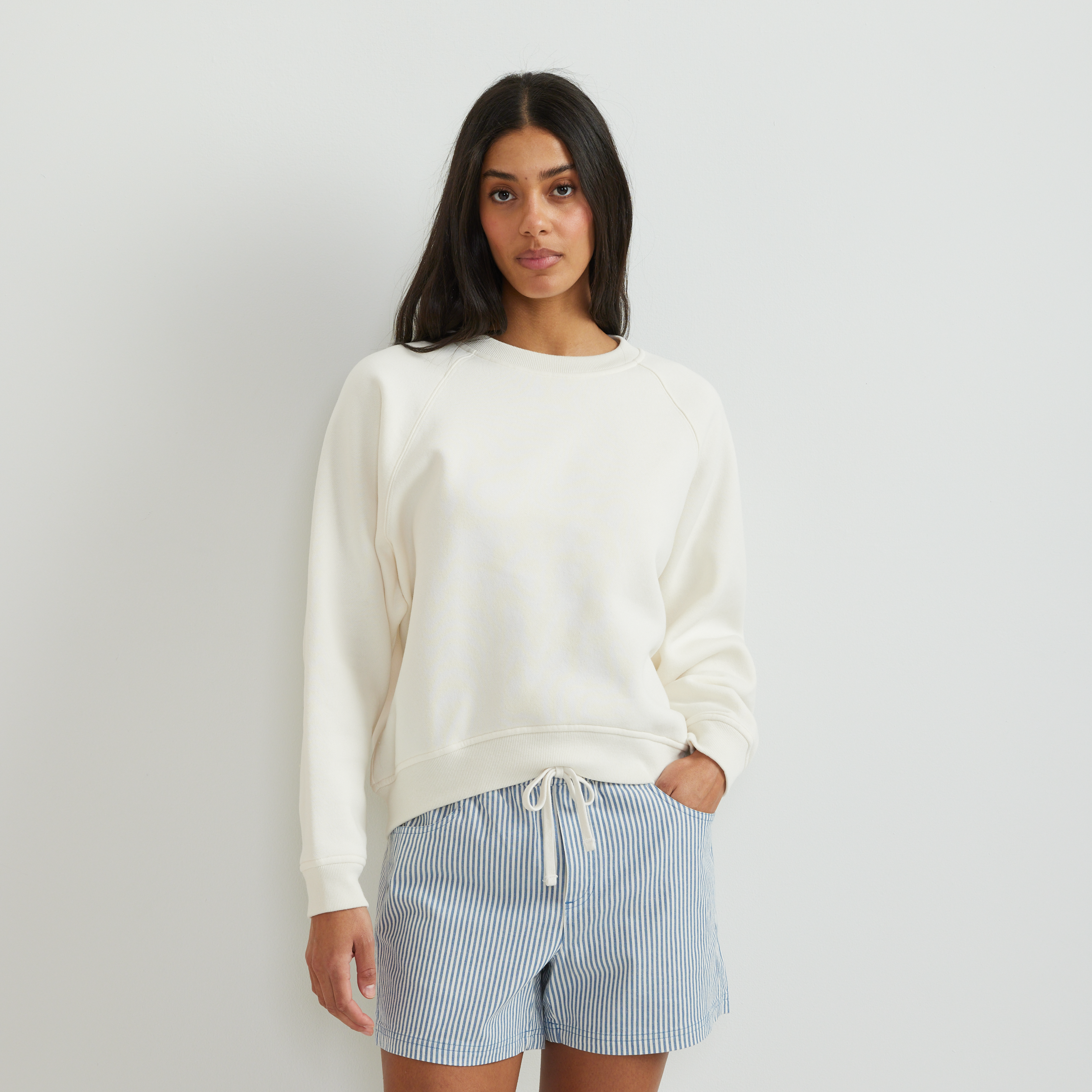 Women's long-sleeve crew sweatshirt with ribbed trims and raglan sleeves