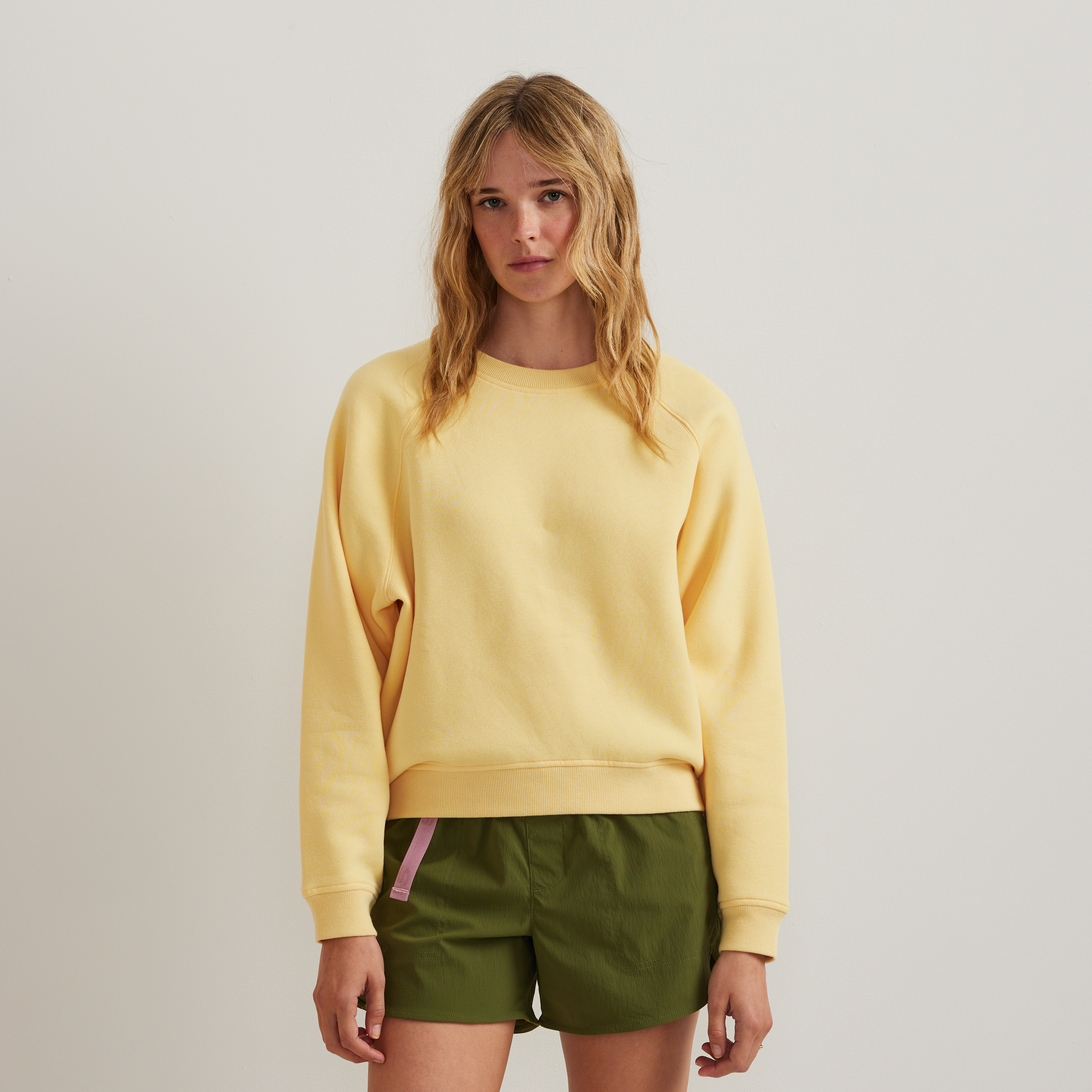 Women's long-sleeve crew sweatshirt with ribbed trims and raglan sleeves