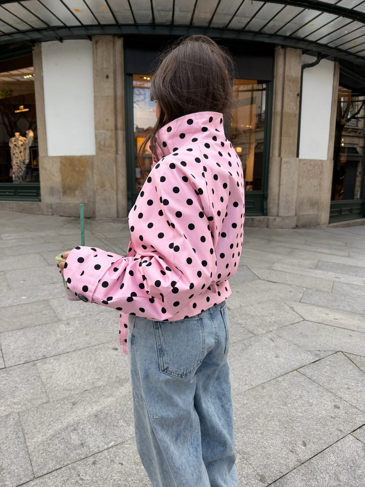 Women's pink cropped jacket with black polka dots, high collar and tie waist