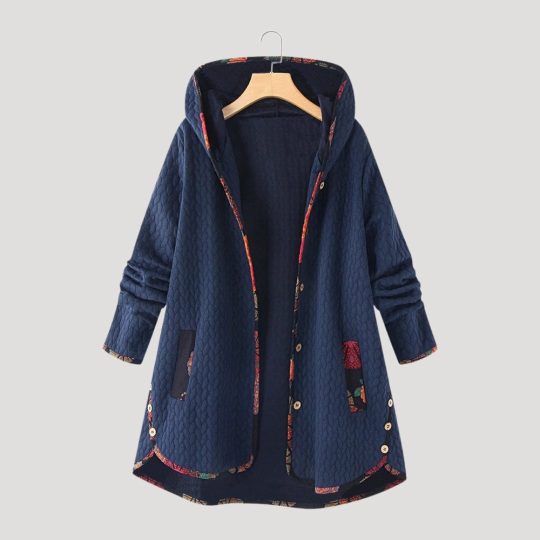 Women's long hooded quilted winter coat with button front and patch pockets