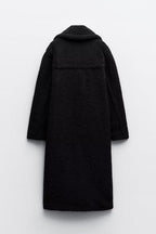 Women's long teddy coat with notched lapels and button front