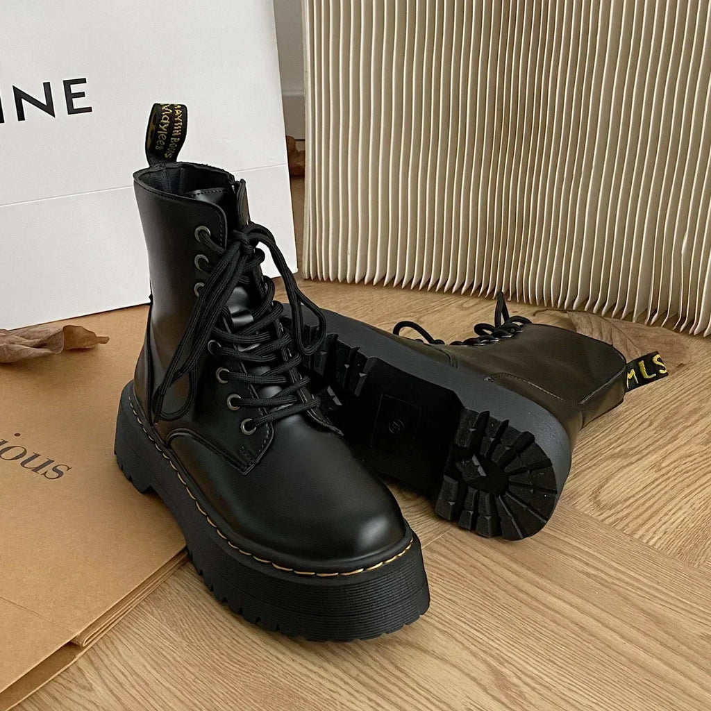 Women's black lace-up combat boots with chunky platform soles
