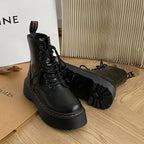 Women's black lace-up combat boots with chunky platform soles