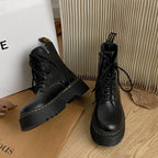 Women's black lace-up combat boots with chunky platform soles