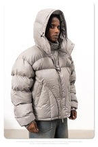 Men's stone hooded puffer jacket with quilted sections and front zip