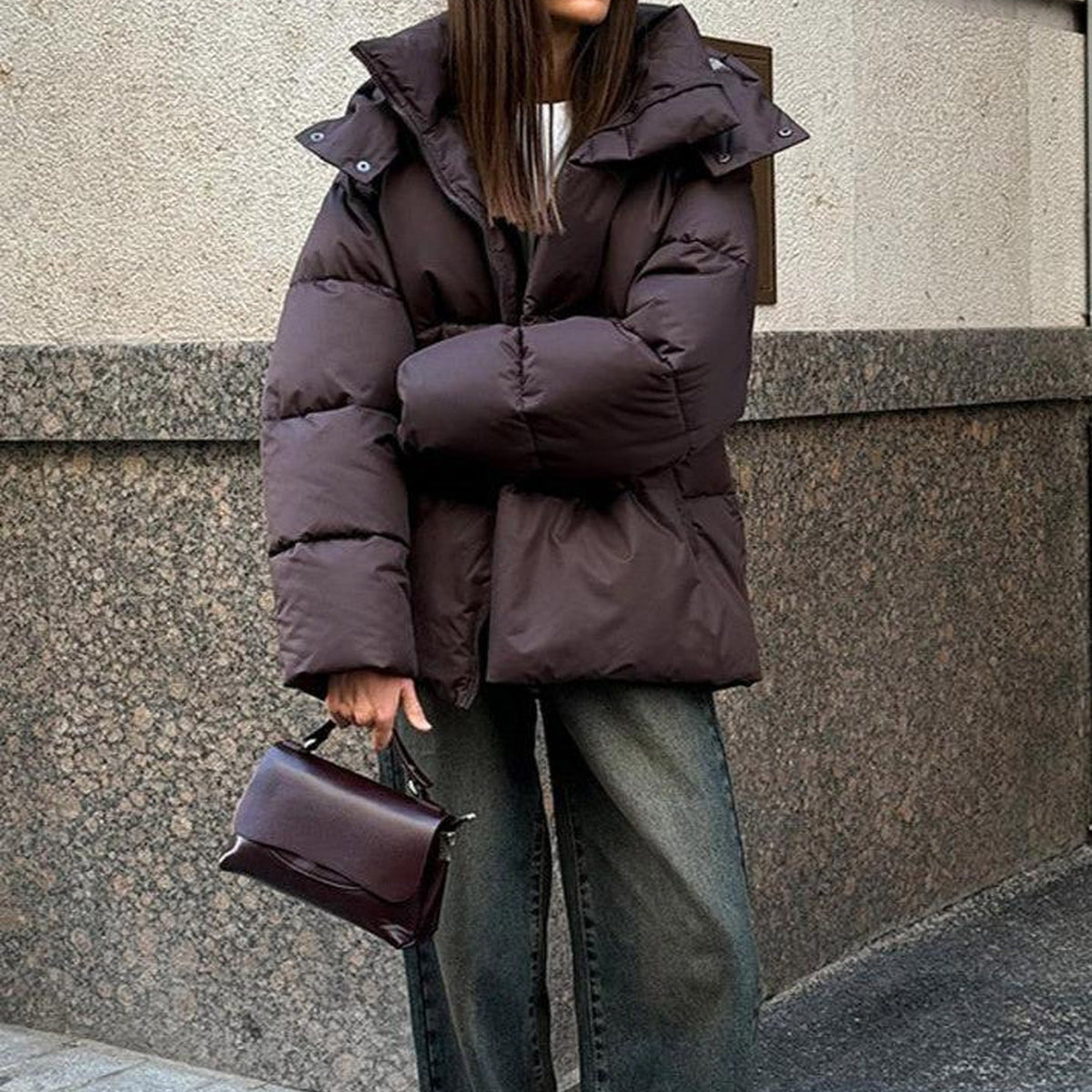 Women's hooded quilted puffer winter jacket with long sleeves and front zip