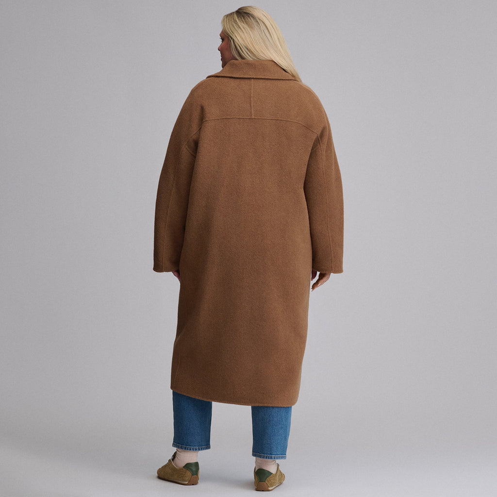 Women's camel long coat with notched lapels, button front and patch pockets