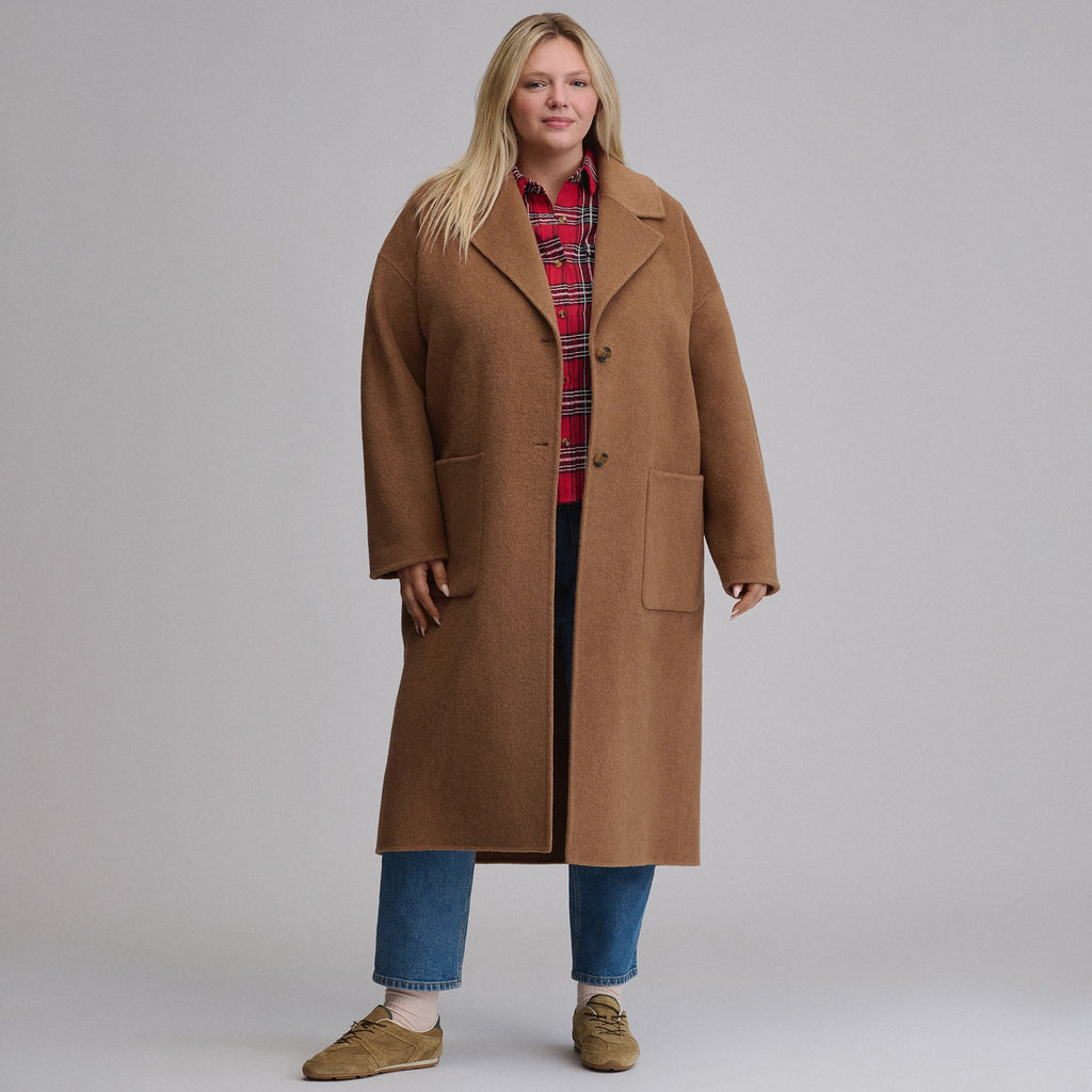 Women's camel long coat with notched lapels, button front and patch pockets