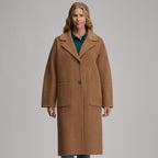 Women's camel long coat with notched lapels, button front and patch pockets