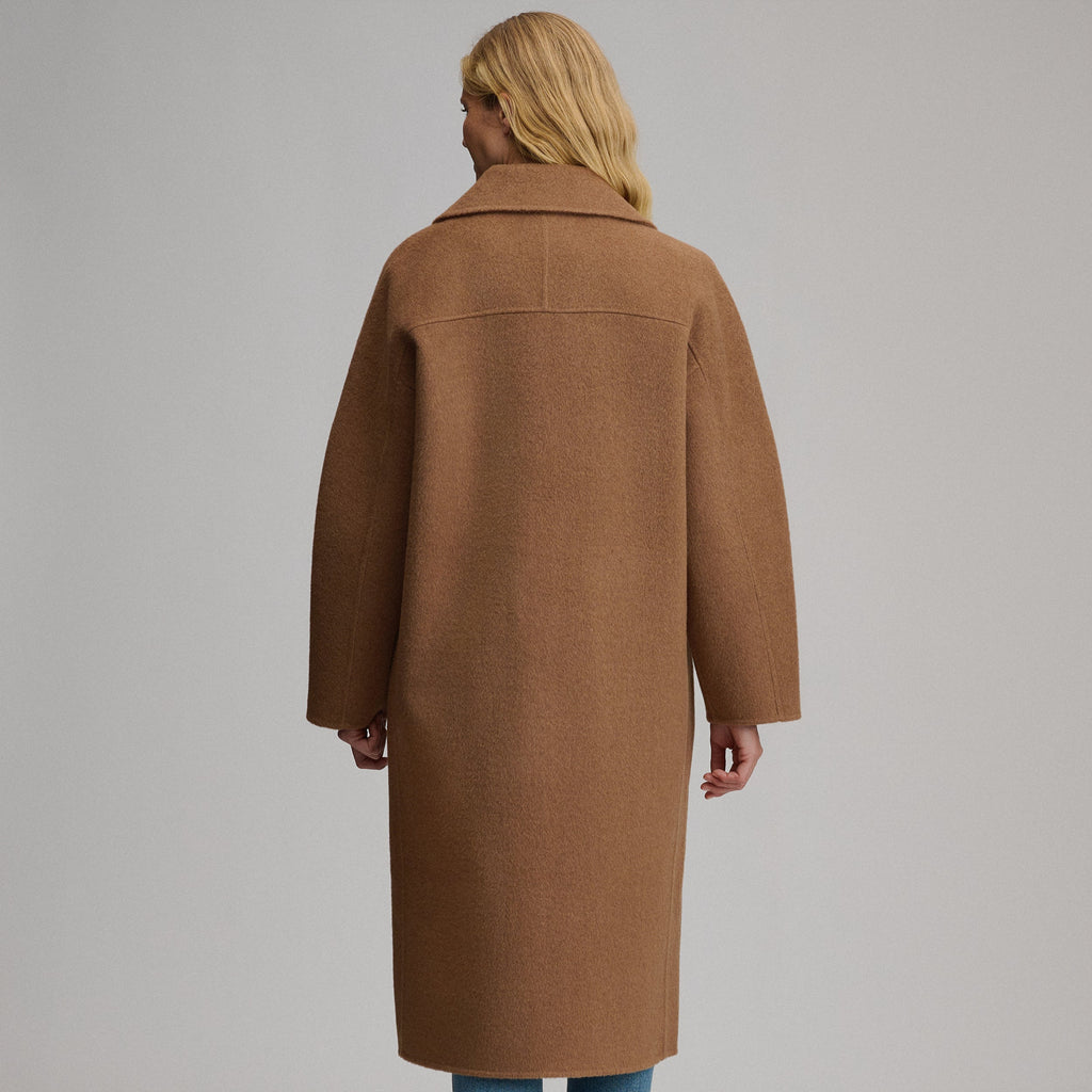 Women's camel long coat with notched lapels, button front and patch pockets