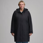 Women's long hooded waterproof trench coat with front zip and welt pockets