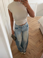 Women's light blue high-waisted wide leg jeans with darker side panels