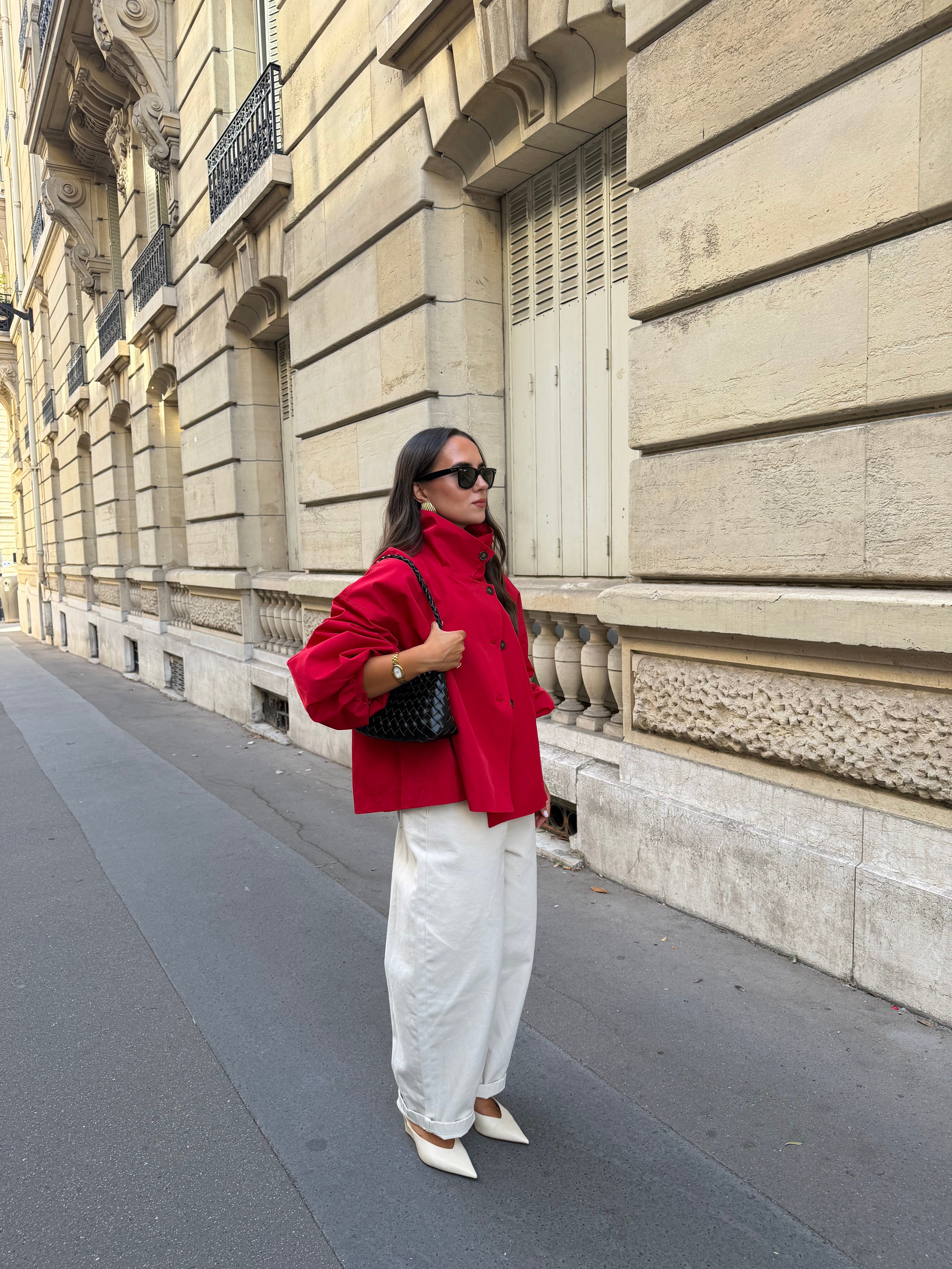 Women's red parka jacket with stand collar and button front