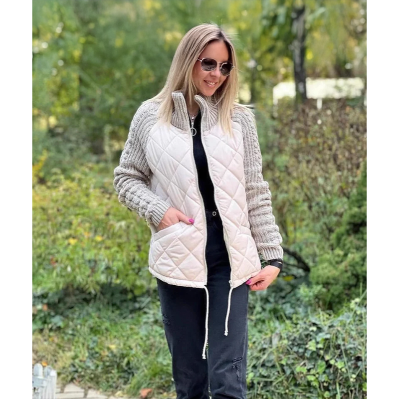 Women's quilted jacket with textured knitted sleeves, stand collar and zip front
