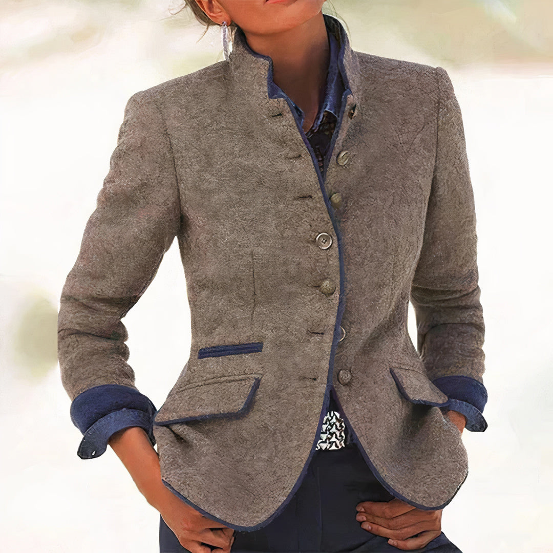 Women's grey textured blazer with mandarin collar, buttons and flap pockets