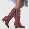 Women's mid-calf cowboy boots with fringe trim, pointed toes and block heels