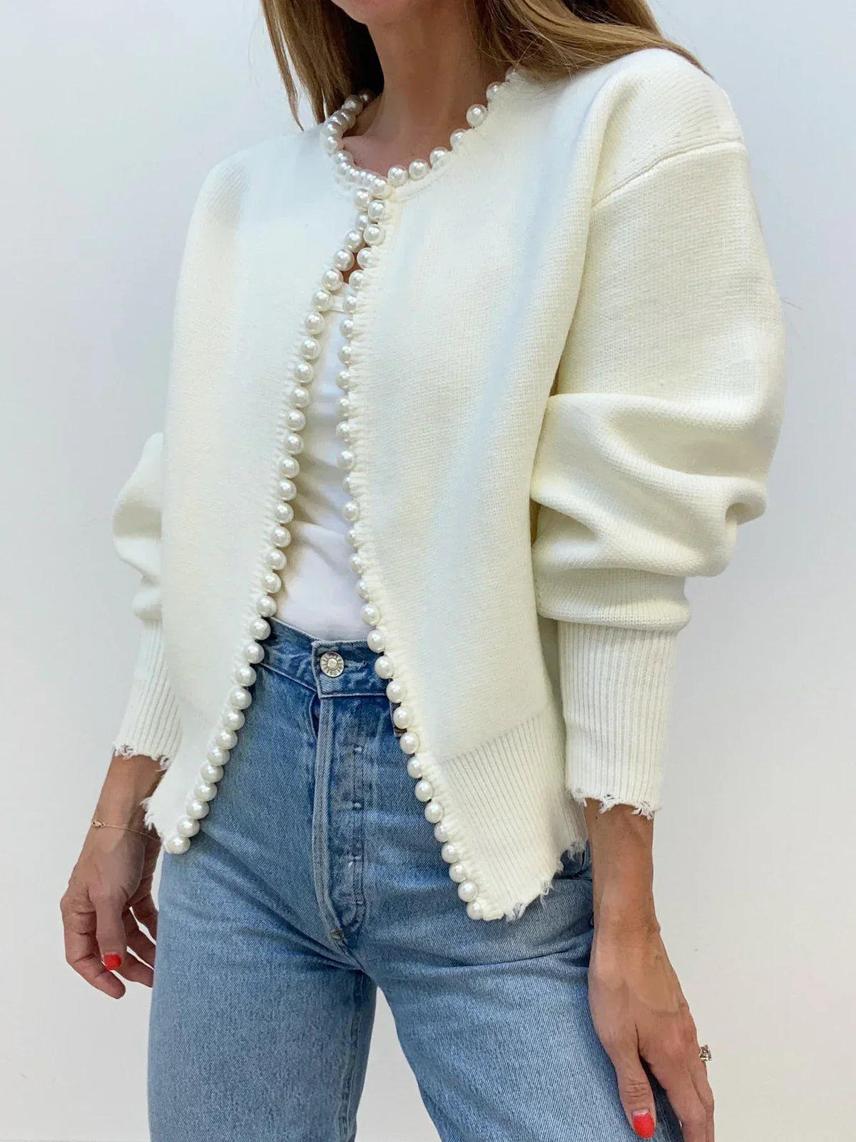 Women's open-front cardigan with pearl-style trim and long sleeves