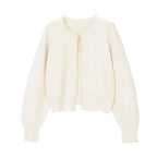Women's open-front cardigan with pearl-style trim and long sleeves