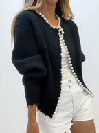 Women's open-front cardigan with pearl-style trim and long sleeves