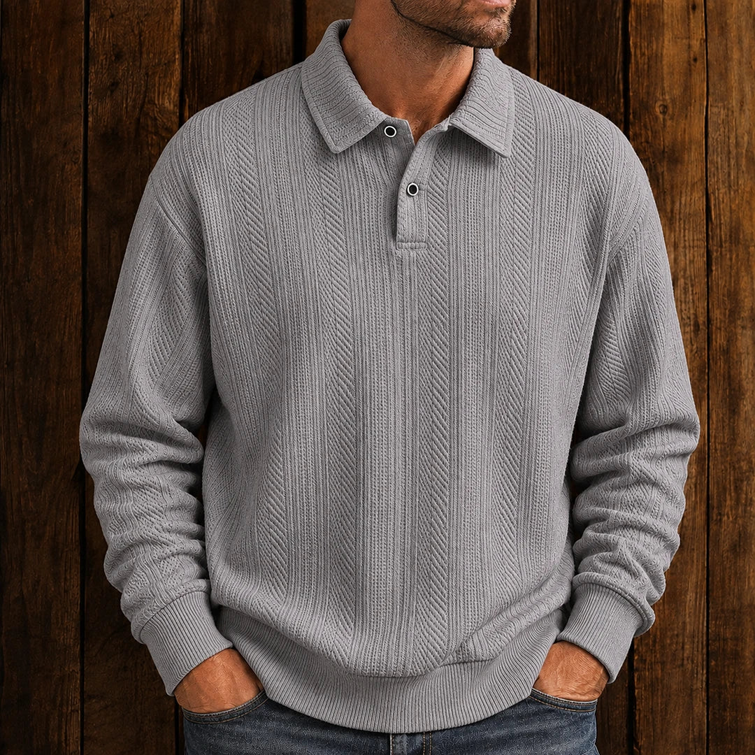 Men's long-sleeve textured polo sweater with collared neckline and button placket
