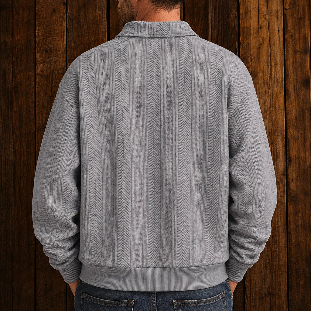 Men's long-sleeve textured polo sweater with collared neckline and button placket