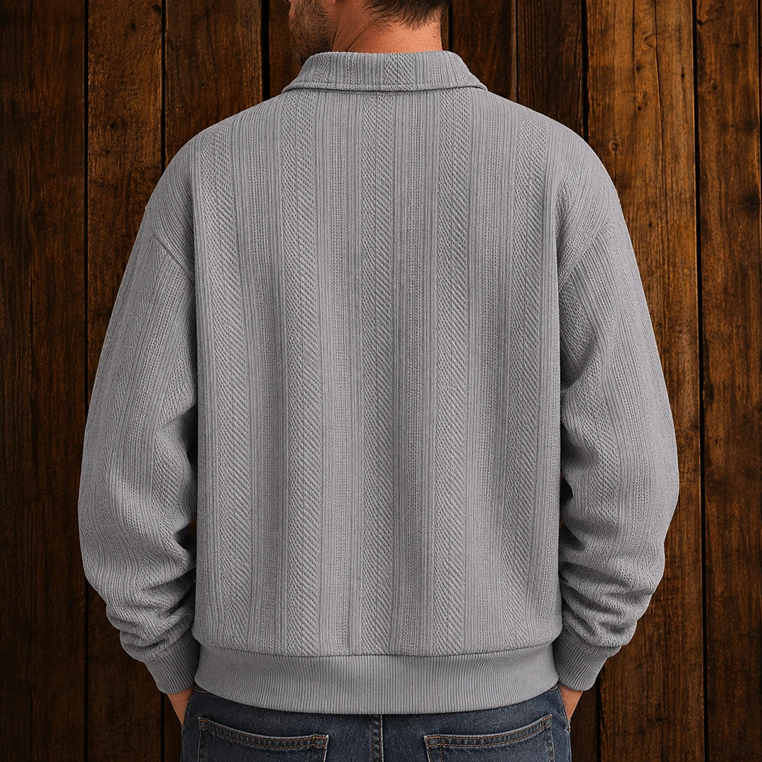 Men's long-sleeve textured polo sweater with collared neckline and button placket