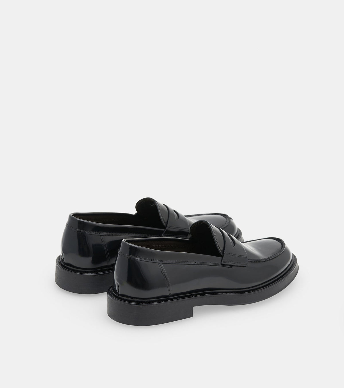 Men's glossy black penny loafers with rounded toes and low heels