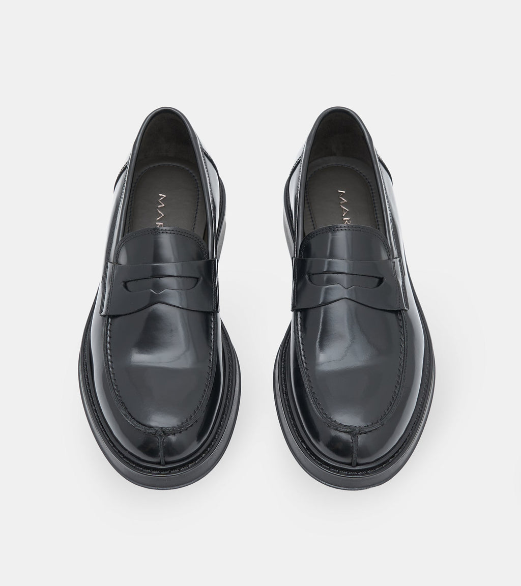 Men's glossy black penny loafers with rounded toes and low heels