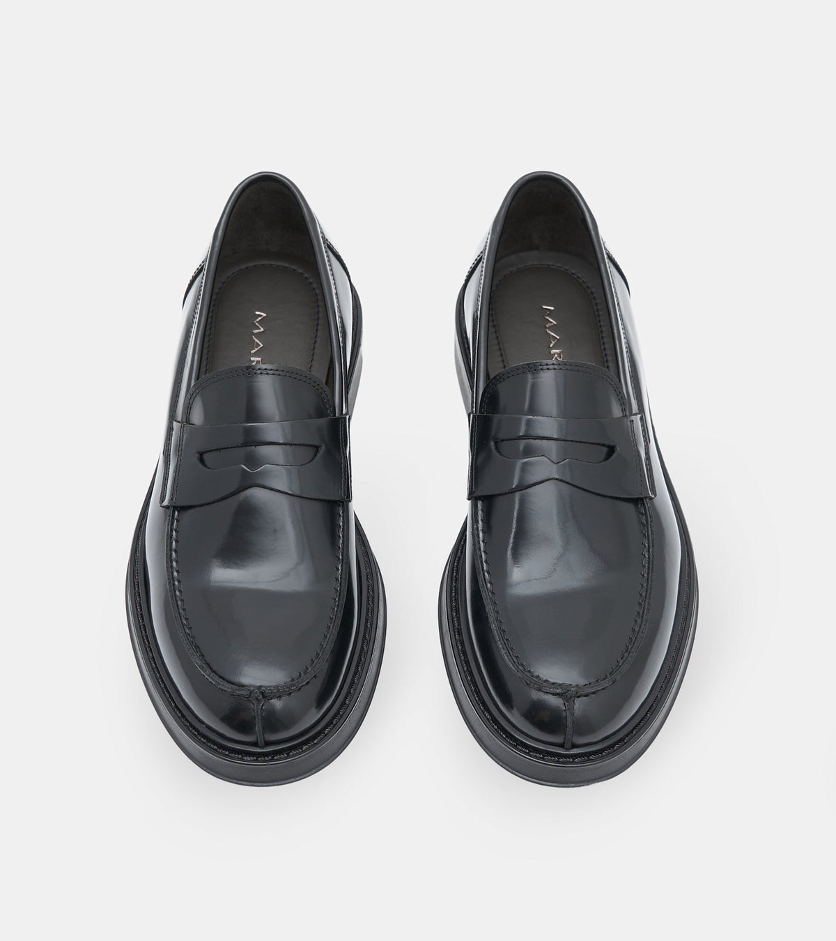 Men's glossy black penny loafers with rounded toes and low heels