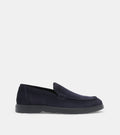 Men's navy blue slip-on loafers with penny strap detail and flat sole
