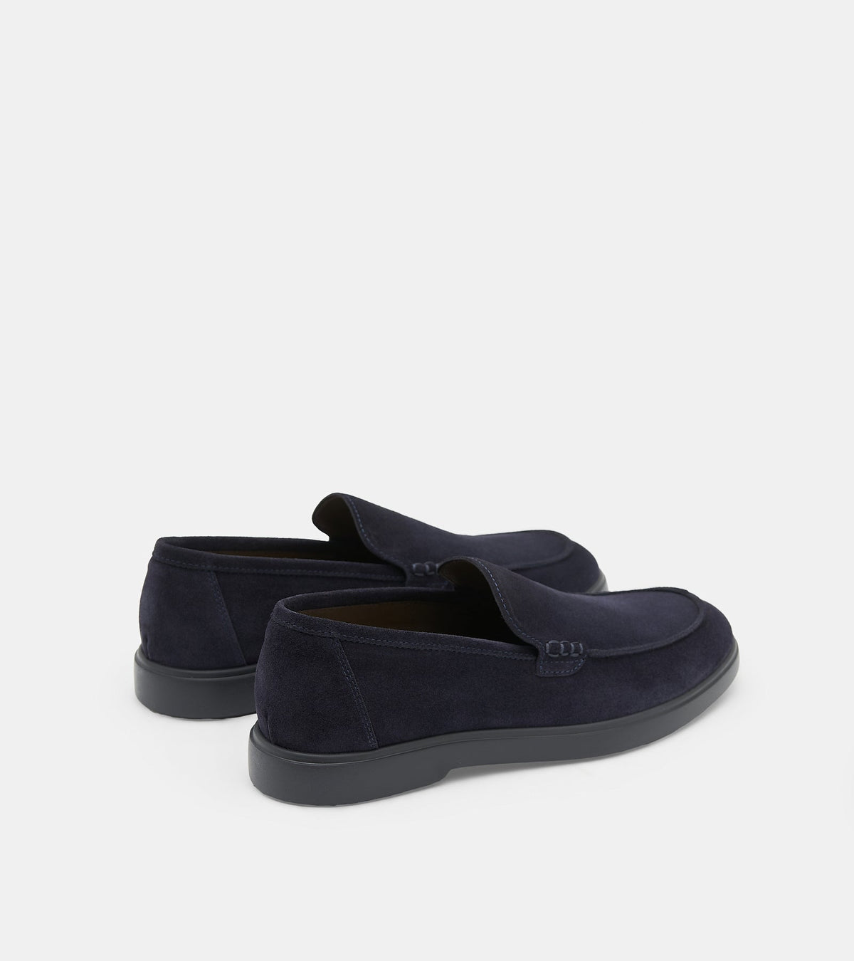 Men's navy blue slip-on loafers with penny strap detail and flat sole