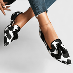 Women's pointed animal print loafers with tassel detail