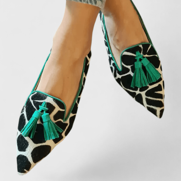 Women's pointed animal print loafers with tassel detail
