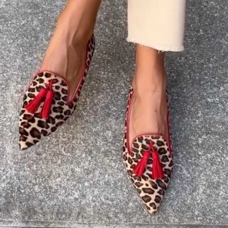 Women's pointed animal print loafers with tassel detail