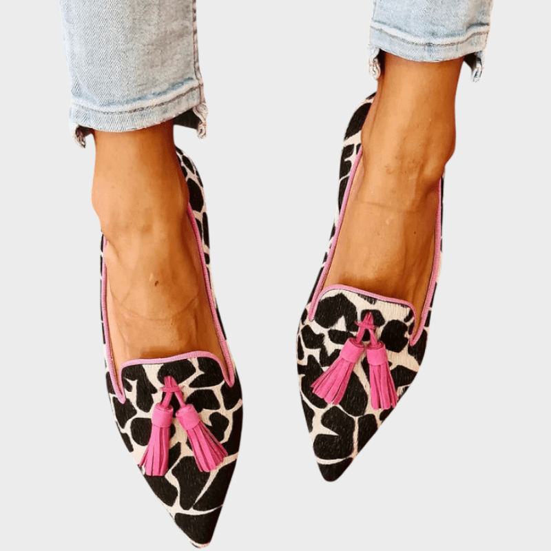 Women's pointed animal print loafers with tassel detail