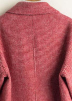 Women's checked tunic coat with notched lapels, long sleeves and front patch pockets
