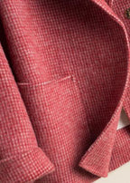 Women's checked tunic coat with notched lapels, long sleeves and front patch pockets