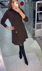 Women's plain long-sleeve mini dress with mock neckline, side pleats and decorative waist chain