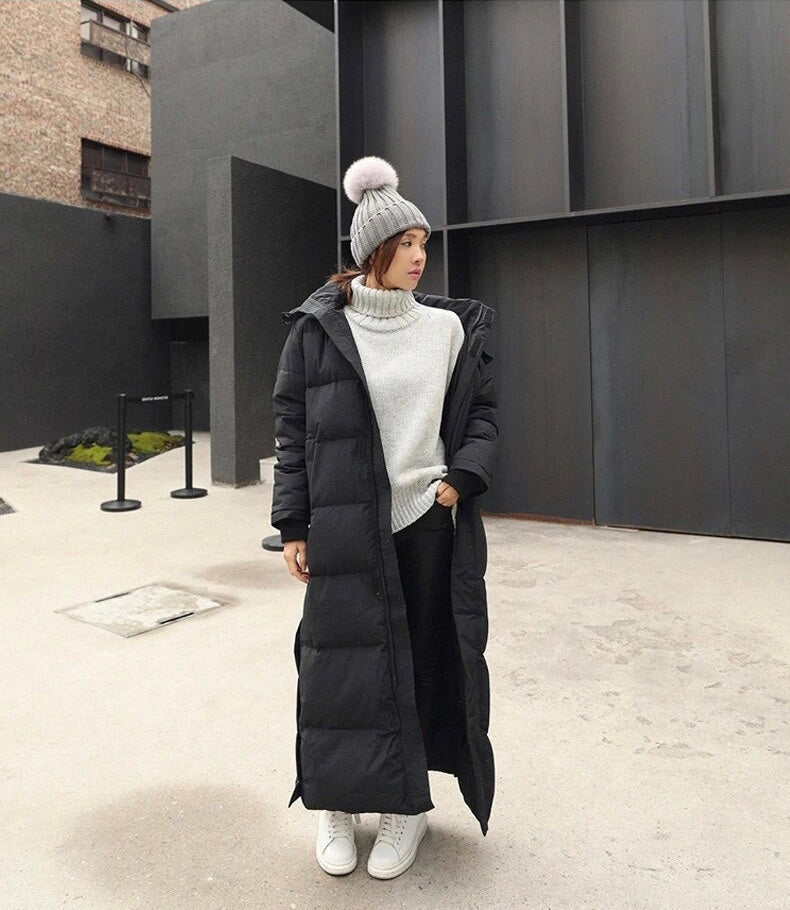 Women's long quilted puffer coat with hood and side pockets