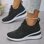 Women's low-top lace-up trainers with geometric decorative detailing and platform soles