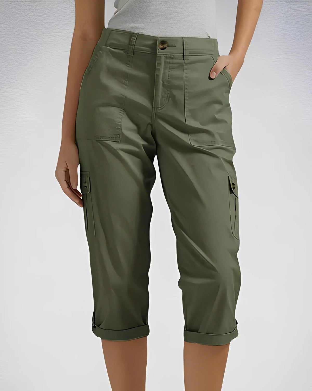 Women's cropped cargo trousers with rolled cuffs and multiple utility pockets