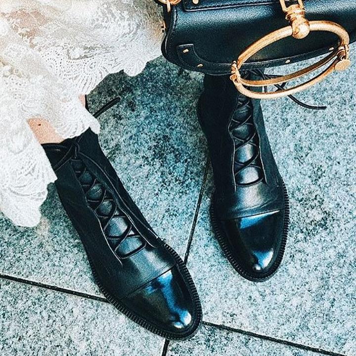 Women's tall lace-up boots with almond toes and contrasting toe caps