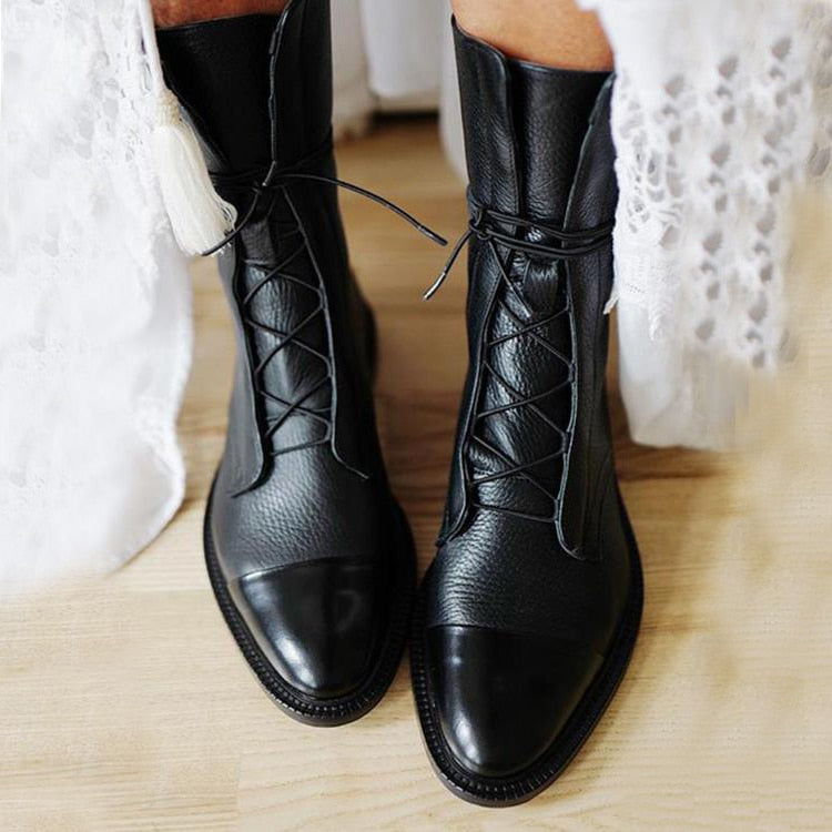 Women's tall lace-up boots with almond toes and contrasting toe caps