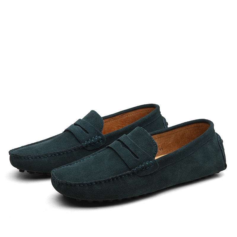 Men's low-profile loafers with moc toe and vamp strap detail