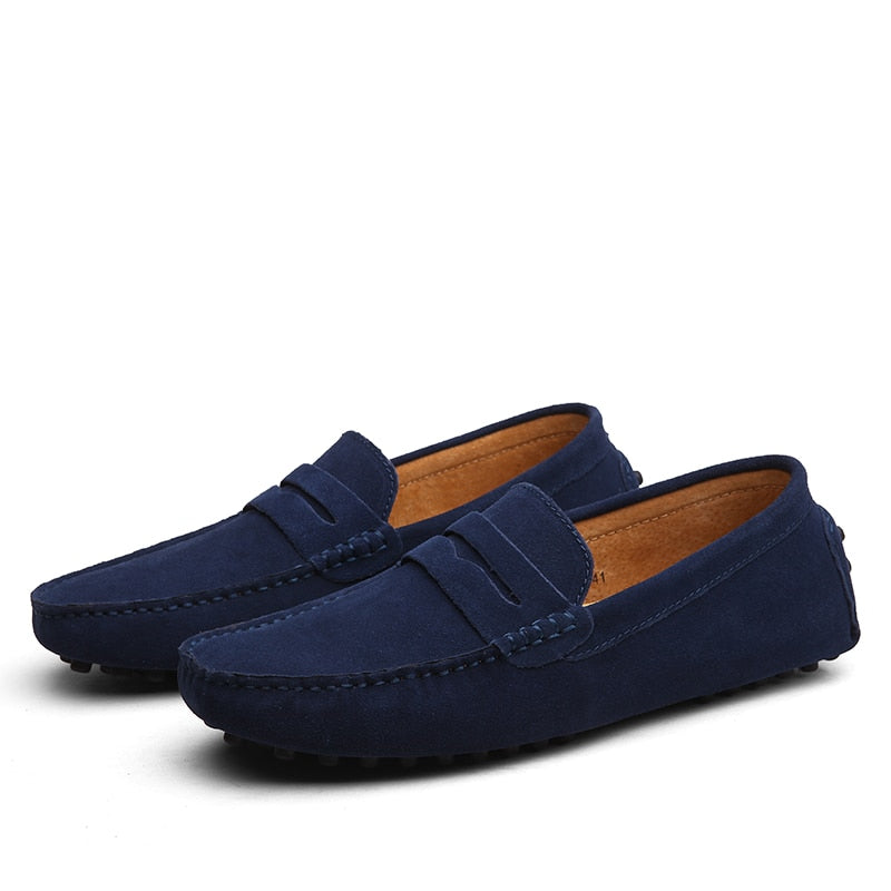 Men's low-profile loafers with moc toe and vamp strap detail